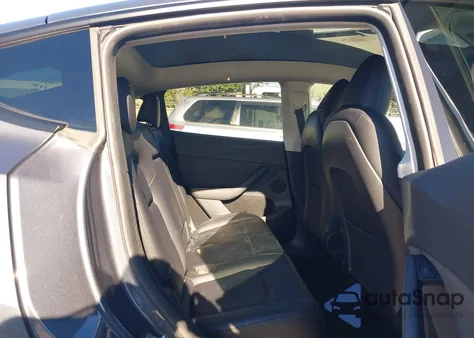 2023 Tesla Model Y Rwd из США, поврежденный, VIN 7SAYGDED5PF980101